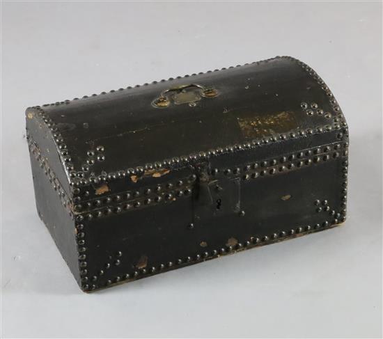An 18th century small domed topped leather trunk, W.17.5in. D.10in. H.9in.